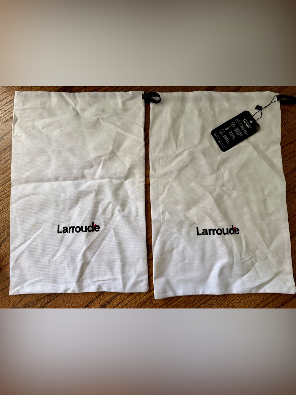 Larroude White Drawstring Storage Bags with Black Logo